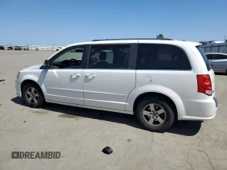2011 Dodge Grand Caravan Crew with VIN 2D4RN5DG4BR699707, listed as a Copart auction lot 52055425 with 144,904 mi miles and Salvage Title. Bid and sale history available at DreamBid. Image 2.