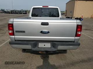 2010 Ford Ranger XLT with VIN 1FTKR4EE6APA01141, listed as a Copart auction lot 54953855 with 130,607 mi miles and Salvage title. Bid and sale history available at DreamBid. Image 6.