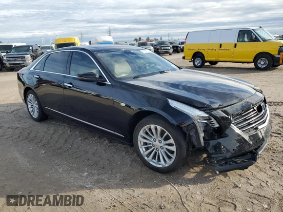 2018 Cadillac CT6 RWD with VIN 1G6KA5RX4JU113613, listed as a Copart auction lot 83983134 with 112,787 mi miles and Salvage Title. Bid and sale history available at DreamBid. Image 4.