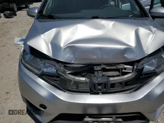 2015 Honda Fit LX z VIN 3HGGK5H52FM738587, wystawiony jako Copart lot #61231705 z przebiegiem 134 623 mil mil oraz Szkoda całkowita • Salvage title. Historia ofert i sprzedaży dostępna na DreamBid. Obrazek 11.