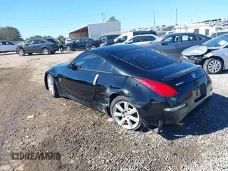 2003 Nissan 350Z Touring z VIN JN1AZ34E73T014727, wystawiony jako IAAI lot #41377420 z przebiegiem 170 323 mil mil oraz . Historia ofert i sprzedaży dostępna na DreamBid. Obrazek 3.