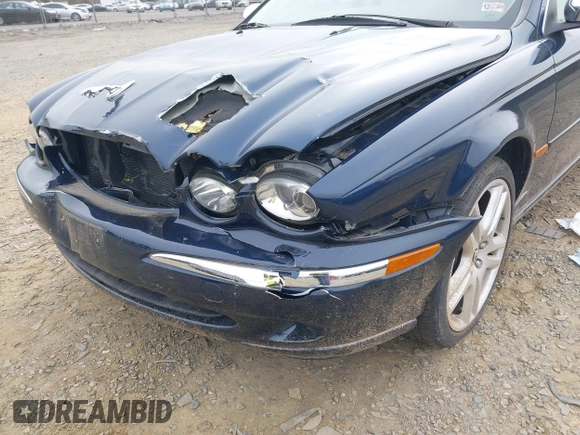 2007 Jaguar X-Type z VIN SAJWA51A27WJ11735, wystawiony jako IAAI lot #41934652 z przebiegiem 43 519 mil mil oraz . Historia ofert i sprzedaży dostępna na DreamBid. Obrazek 6.