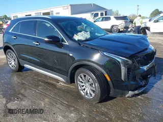 2021 Cadillac XT4 FWD Premium Luxury with VIN 1GYFZCR43MF052422, listed as a IAAI auction lot 41985859 with 25,112 mi miles. Bid and sale history available at carsss.com. Image 1.
