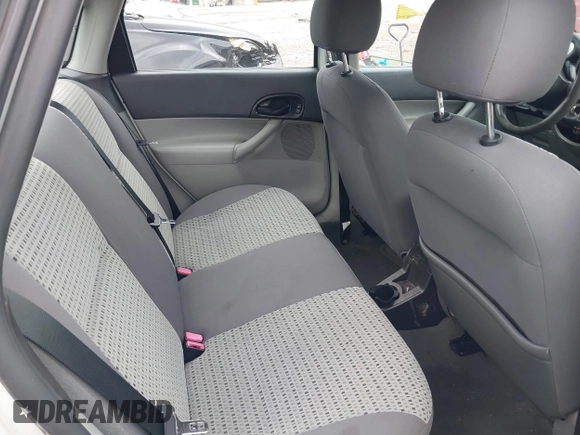 2007 Ford Focus S z VIN 1FAFP34N07W236755, wystawiony jako IAAI lot #42536269 z przebiegiem 116 074 mil mil oraz . Historia ofert i sprzedaży dostępna na DreamBid. Obrazek 8.