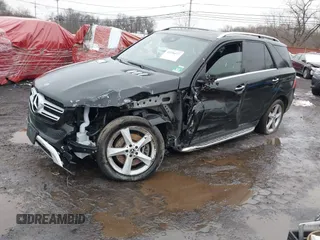 2019 Mercedes-Benz GLE 400 with VIN 4JGDA5GB3KB207679, listed as a IAAI auction lot 41556577 with 199,755 mi miles and . Bid and sale history available at DreamBid. Image 2.