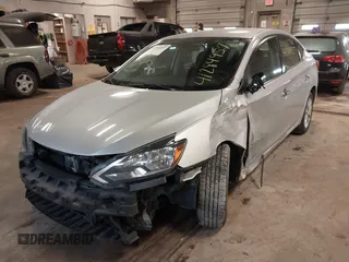 2019 Nissan Sentra S z VIN 3N1AB7AP7KY345072, wystawiony jako IAAI lot #41284957 z przebiegiem 104 084 mil mil oraz . Historia ofert i sprzedaży dostępna na DreamBid. Obrazek 6.