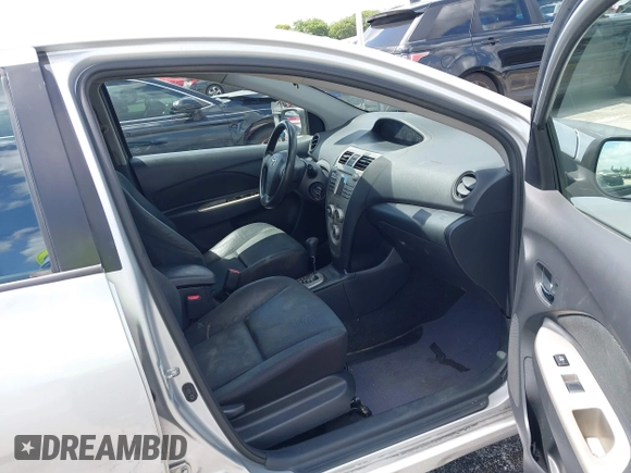 2010 Toyota Yaris with VIN JTDBT4K30A4067769, listed as a IAAI auction lot 42072347 with 266,213 mi miles. Bid and sale history available at carsss.com. Image 5.