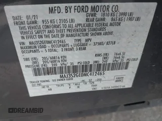 2021 Ford EcoSport SE z VIN MAJ3S2GE0MC412465, wystawiony jako IAAI lot #41899486 z przebiegiem 76 681 mil mil oraz . Historia ofert i sprzedaży dostępna na DreamBid. Obrazek 9.