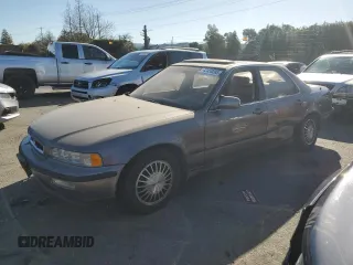 1992 Acura Legend L with VIN JH4KA7662NC008325, listed as a Copart auction lot 42459295 with 130,041 mi miles and Salvage Title. Bid and sale history available at DreamBid. Image 1.