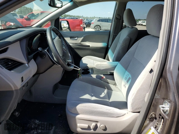 2017 Toyota Sienna LE Auto Access Seat with VIN 5TDKZ3DC1HS777624, listed as a Copart auction lot 50633175 with 139,852 mi miles and Salvage Title. Bid and sale history available at DreamBid. Image 7.