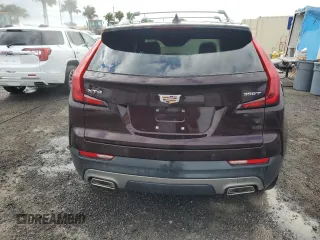 2021 Cadillac XT4 FWD Premium Luxury z VIN 1GYFZCR45MF080027, wystawiony jako Copart lot #46195835 z przebiegiem Nie podano mil oraz Nie do naprawy • Non repairable. Historia ofert i sprzedaży dostępna na DreamBid. Obrazek 6.