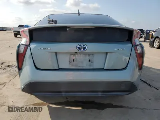 2017 Toyota Prius Two z VIN JTDKBRFU1H3545894, wystawiony jako Copart lot #54565485 z przebiegiem 88 745 mil mil oraz Czysty tytuł • Clean title. Historia ofert i sprzedaży dostępna na DreamBid. Obrazek 6.