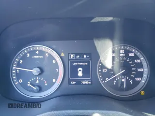 2018 Hyundai Tucson Sport z VIN KM8J3CAL7JU762737, wystawiony jako Copart lot #83538404 z przebiegiem 76 983 mil mil oraz Szkoda całkowita • Salvage title. Historia ofert i sprzedaży dostępna na DreamBid. Obrazek 9.