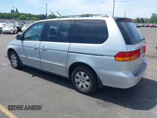 2003 Honda Odyssey EX-L with VIN 5FNRL18993B098670, listed as a IAAI auction lot 42781006 with 222,584 mi miles and . Bid and sale history available at DreamBid. Image 3.
