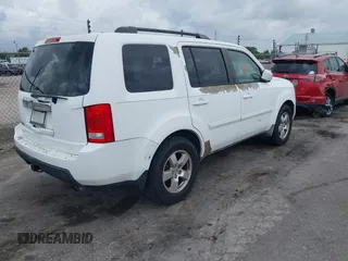 2011 Honda Pilot EX with VIN 5FNYF3H48BB029583, listed as a IAAI auction lot 42096963 with 263,545 mi miles and . Bid and sale history available at carsss.com. Image 4.