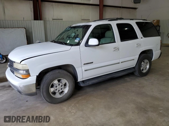 2001 Chevrolet Tahoe LT with VIN 1GNEC13T01R128767, listed as a Copart auction lot 71545634 with 307,271 mi miles and Salvage Title. Bid and sale history available at carsss.com. Image 1.