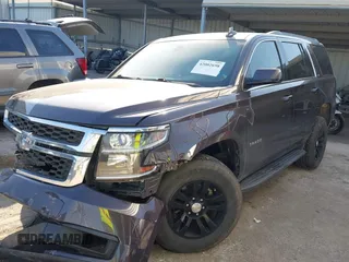 2015 Chevrolet Tahoe LS with VIN 1GNSCAKCXFR628303, listed as a IAAI auction lot 42002698 with 152,141 mi miles and . Bid and sale history available at DreamBid. Image 17.