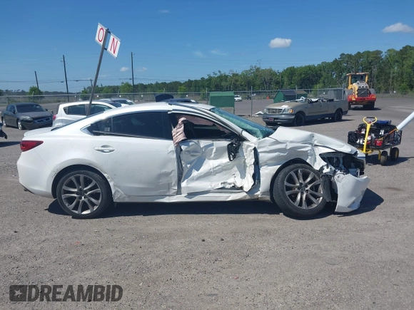 2016 Mazda Mazda6 i Grand Touring with VIN JM1GJ1W55G1443186, listed as a IAAI auction lot 42063716 with 114,263 mi miles. Bid and sale history available at carsss.com. Image 13.