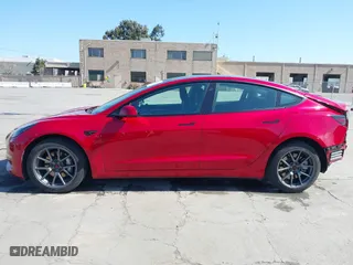 2021 Tesla Model 3 Standard Range Plus with VIN 5YJ3E1EA0MF099562, listed as a IAAI auction lot 41771323 with 26,087 mi miles. Bid and sale history available at carsss.com. Image 15.
