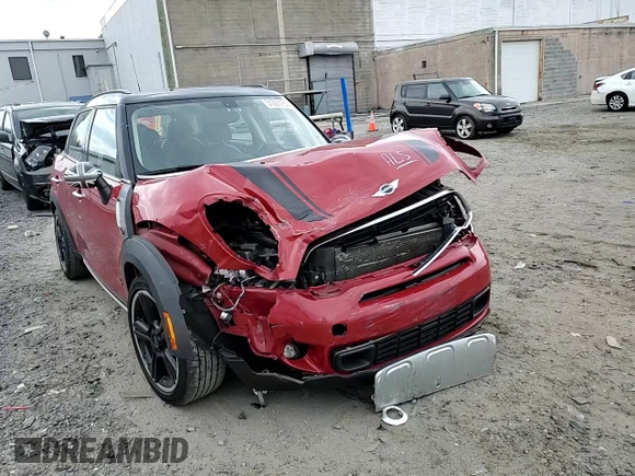 2016 MINI Countryman S with VIN WMWZC5C51GWU01015, listed as a Copart auction lot 51223155 with 74,602 mi miles and Salvage Title. Bid and sale history available at DreamBid. Image 11.