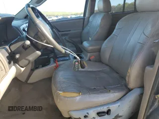 2004 Jeep Grand Cherokee Laredo z VIN 1J4GW48S74C159381, wystawiony jako Copart lot #53972115 z przebiegiem 128 309 mil mil oraz Szkoda całkowita • Salvage title. Historia ofert i sprzedaży dostępna na DreamBid. Obrazek 7.