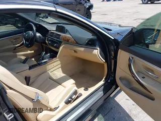 2016 BMW 4 Series 428i z VIN WBA3V7C54G5A25320, wystawiony jako IAAI lot #42318239 z przebiegiem 74 884 mil mil oraz . Historia ofert i sprzedaży dostępna na DreamBid. Obrazek 5.
