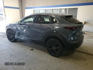 2022 Mazda CX-30 S Carbon Edition с VIN 3MVDMBCL7NM429131, выставлен на аукционе Copart как лот 42421695 с пробегом 21 825 миль миль и Списание • Salvage title. История ставок и продаж доступна на DreamBid. Изображение 2.