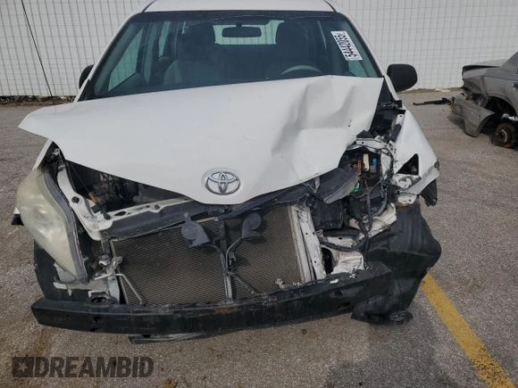 2012 Toyota Sienna with VIN 5TDZK3DC6CS244891, listed as a Copart auction lot 54442055 with 137,680 mi miles and Salvage title. Bid and sale history available at DreamBid. Image 5.