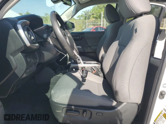 2023 Toyota Tacoma SR5 z VIN 3TMAZ5CN3PM212056, wystawiony jako Copart lot #57217735 z przebiegiem 36 533 mil mil oraz Szkoda całkowita • Salvage title. Historia ofert i sprzedaży dostępna na DreamBid. Obrazek 7.