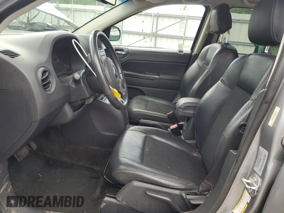 2017 Jeep Compass Sport with VIN 1C4NJCBAXHD166993, listed as a Copart auction lot 61578975 with 95,787 mi miles and Salvage title. Bid and sale history available at DreamBid. Image 7.
