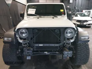 2019 Jeep Wrangler Unlimited Sport S z VIN 1C4HJXDG4KW639403, wystawiony jako IAAI lot #42158096 z przebiegiem 132 569 mil mil oraz . Historia ofert i sprzedaży dostępna na DreamBid. Obrazek 13.