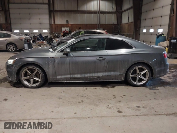 2018 Audi A5 Premium Plus with VIN WAUTNAF50JA011354, listed as a IAAI auction lot 41396659 with 74,936 mi miles and . Bid and sale history available at DreamBid. Image 14.