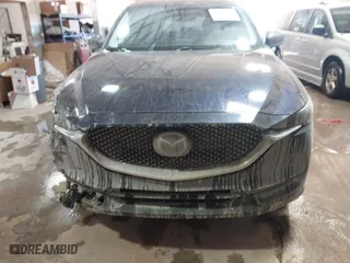 2020 Mazda CX-5 Grand Touring with VIN JM3KFADM4L0780817, listed as a IAAI auction lot 41632816 with 62,290 mi miles. Bid and sale history available at carsss.com. Image 12.