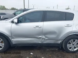 2018 Kia Sportage LX with VIN KNDPM3AC7J7337951, listed as a IAAI auction lot 41900482 with 105,857 mi miles and . Bid and sale history available at carsss.com. Image 14.