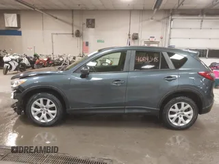 2013 Mazda CX-5 Touring with VIN JM3KE4CE4D0157892, listed as a IAAI auction lot 41684348 with 146,496 mi miles and . Bid and sale history available at DreamBid. Image 15.