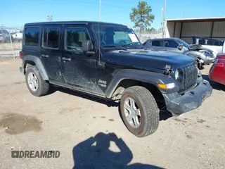 2020 Jeep Wrangler Unlimited Sport Altitude with VIN 1C4HJXDG0LW171400, listed as a IAAI auction lot 41373446 with 82,113 mi miles and . Bid and sale history available at DreamBid. Image 1.