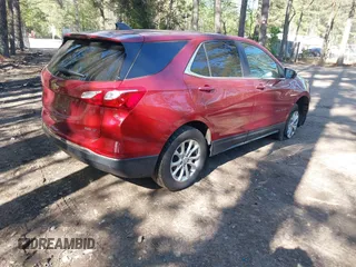 2021 Chevrolet Equinox LT with VIN 2GNAXUEV6M6135144, listed as a IAAI auction lot 42006489 with 83,716 mi miles and . Bid and sale history available at DreamBid. Image 4.