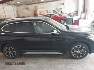 2022 BMW X1 xDrive28i with VIN WBXJG9C09N5U69567, listed as a IAAI auction lot 42273644 with 36,944 mi miles and . Bid and sale history available at DreamBid. Image 13.