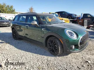 2019 MINI Clubman Cooper with VIN WMWLU1C59K2F29677, listed as a Copart auction lot 77201334 with 57,012 mi miles and Salvage Title. Bid and sale history available at carsss.com. Image 4.