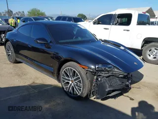 2024 Porsche Taycan z VIN WP0AA2Y17RSA11446, wystawiony jako IAAI lot #42002260 z przebiegiem 21 094 mil mil oraz . Historia ofert i sprzedaży dostępna na DreamBid. Obrazek 1.