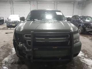 2014 Chevrolet Tahoe Commercial with VIN 1GNSK2E05ER196941, listed as a IAAI auction lot 41938892 with 176,170 mi miles and . Bid and sale history available at DreamBid. Image 13.