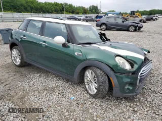 2018 MINI Hardtop 4 Door Cooper with VIN WMWXU1C56J2F79128, listed as a Copart auction lot 60848735 with 35,392 mi miles and Salvage title. Bid and sale history available at DreamBid. Image 4.