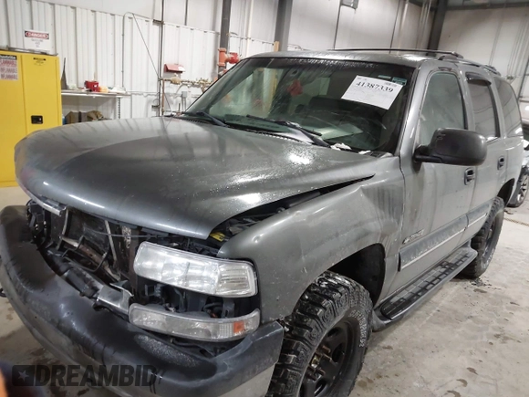 2001 Chevrolet Tahoe LS with VIN 1GNEK13T31R114154, listed as a IAAI auction lot 41387339 with 204,353 mi miles. Bid and sale history available at carsss.com. Image 2.