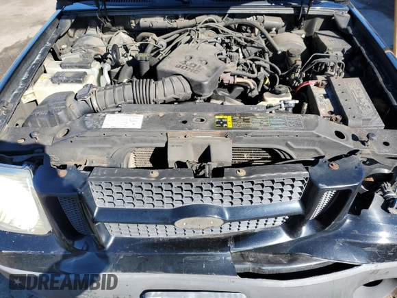 2005 Ford Explorer Sport Trac XLS z VIN 1FMZU77KX5UB73886, wystawiony jako Copart lot #47265195 z przebiegiem 201 148 mil mil oraz Szkoda całkowita • Salvage title. Historia ofert i sprzedaży dostępna na DreamBid. Obrazek 11.