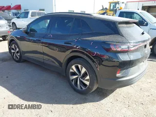 2023 Volkswagen ID.4 Pro with VIN 1V2CMPE82PC008195, listed as a IAAI auction lot 41828830 with 32,336 mi miles and . Bid and sale history available at DreamBid. Image 3.