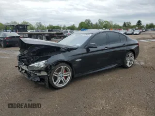 2014 BMW 5 Series 535d xDrive with VIN WBAFV3C51ED684848, listed as a Copart auction lot 57062985 with Not provided miles and Salvage title. Bid and sale history available at DreamBid. Image 1.