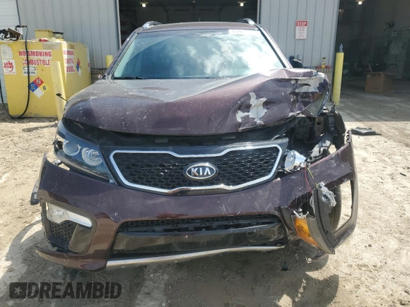 2012 Kia Sorento SX z VIN 5XYKWDA29CG301363, wystawiony jako Copart lot #55954815 z przebiegiem 83 206 mil mil oraz Szkoda całkowita • Salvage title. Historia ofert i sprzedaży dostępna na DreamBid. Obrazek 5.