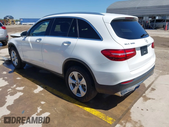 2018 Mercedes-Benz GLC 300 with VIN WDC0G4JB9JV056407, listed as a IAAI auction lot 41965217 with 77,228 mi miles and . Bid and sale history available at DreamBid. Image 3.
