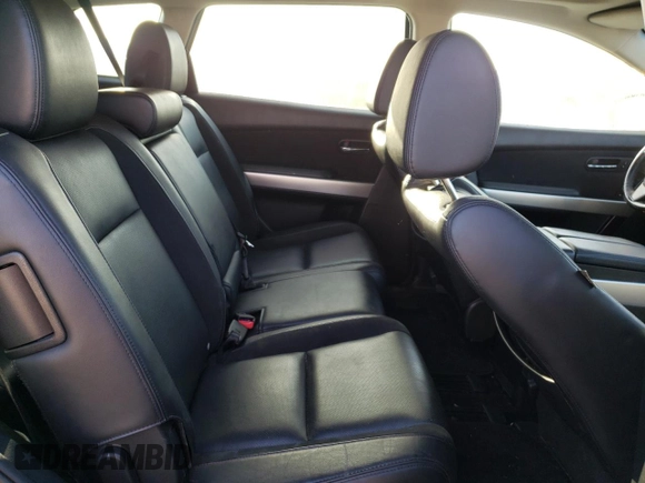 2015 Mazda CX-9 Grand Touring z VIN JM3TB3DV2F0456130, wystawiony jako Copart lot #60545095 z przebiegiem 120 892 mil mil oraz Szkoda całkowita • Salvage title. Historia ofert i sprzedaży dostępna na DreamBid. Obrazek 11.