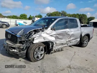 2023 Honda Ridgeline RTL with VIN 5FPYK3F52PB015457, listed as a Copart auction lot 65523355 with 88,565 mi miles and Salvage title. Bid and sale history available at DreamBid. Image 1.